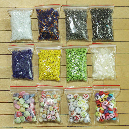 1元1包玻璃瓷珠子米珠字母米白色凹凸亮片手工DIY串珠BJD娃衣头饰