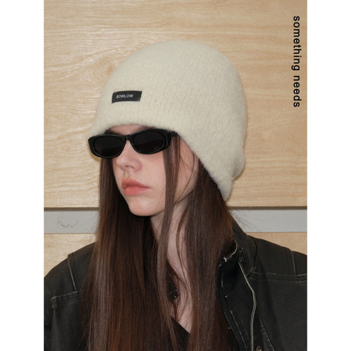 郑佰万冬季含羊毛时尚包头冷帽女