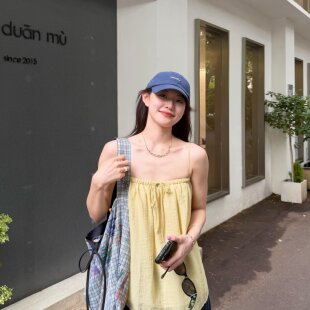 实拍实价温柔度假风气质抽绳宽松显瘦无袖黄色吊带背心