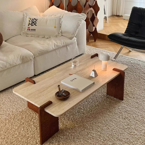 北欧侘寂风洞石岩板轻奢大师设计奶油风简约长方形茶几客厅民宿