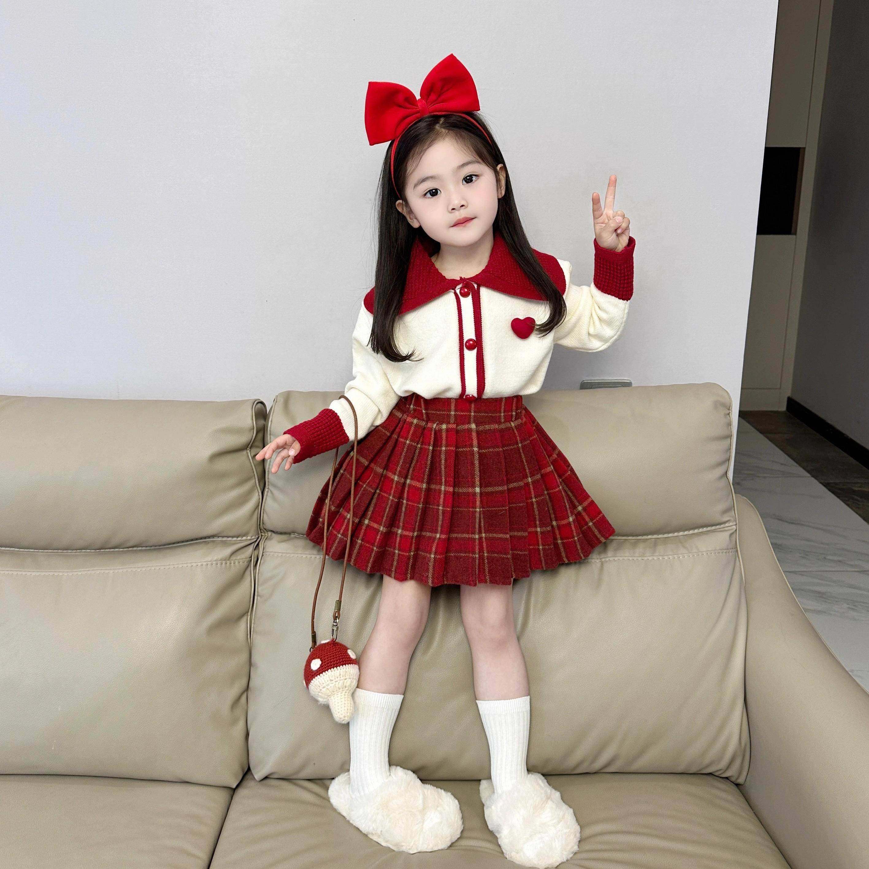半身裙女童春秋冬季2025儿童圣诞红色格子短裙中大童毛呢百褶裙子