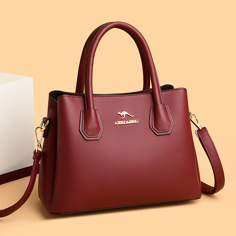 品牌袋鼠真皮手拎包包女2025新款斜挎妈妈包女士大容量百搭手提包