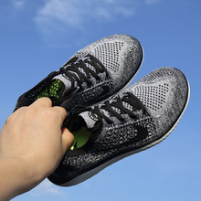 Nike FREE RN FLYKNIT 女子运动飞线轻便透气跑步鞋 942839-101