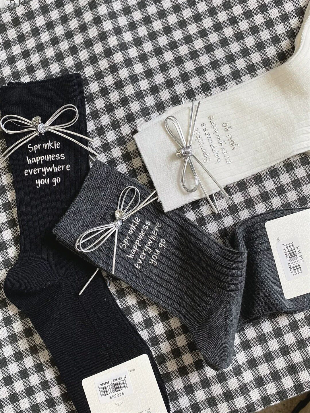 DLSOCK秋冬新款蝴蝶结烫印字母织带标中高帮袜子女欧货潮流时尚