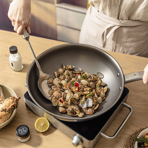 【咨询惊喜】三头鹰纯钛不粘炒锅