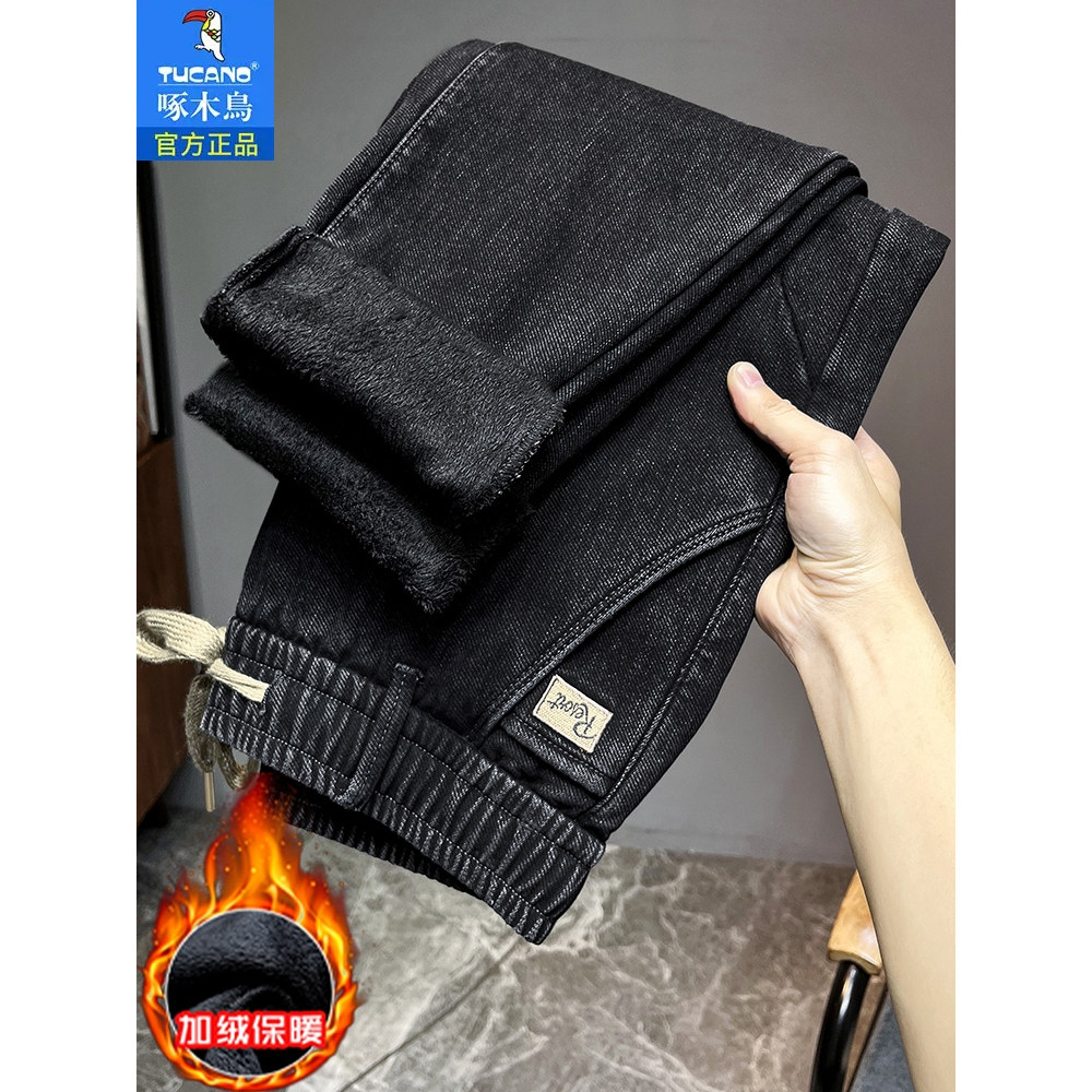 啄木鸟秋冬季加绒加厚款斜口袋松紧腰抽绳牛仔裤男士宽松哈伦潮流