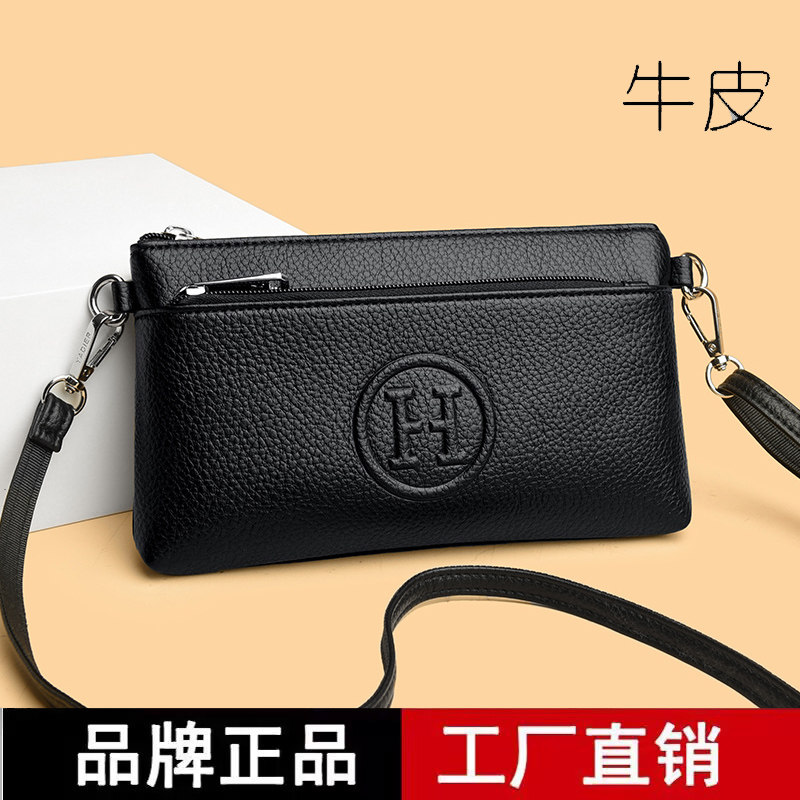 专柜正品真皮手拿包女包