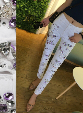 春季新款欧洲站钉珠牛仔裤女白色破洞铅笔裤重工镶钻带水钻休闲裤