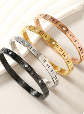 罗切割镂空马字镶钻卡扣钛钢手镯