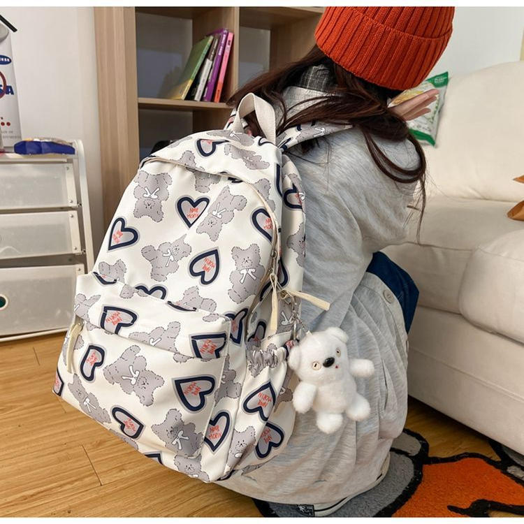 书包女初中生原创小众涂鸦爱心设计双肩包五六年级学生大容量背包