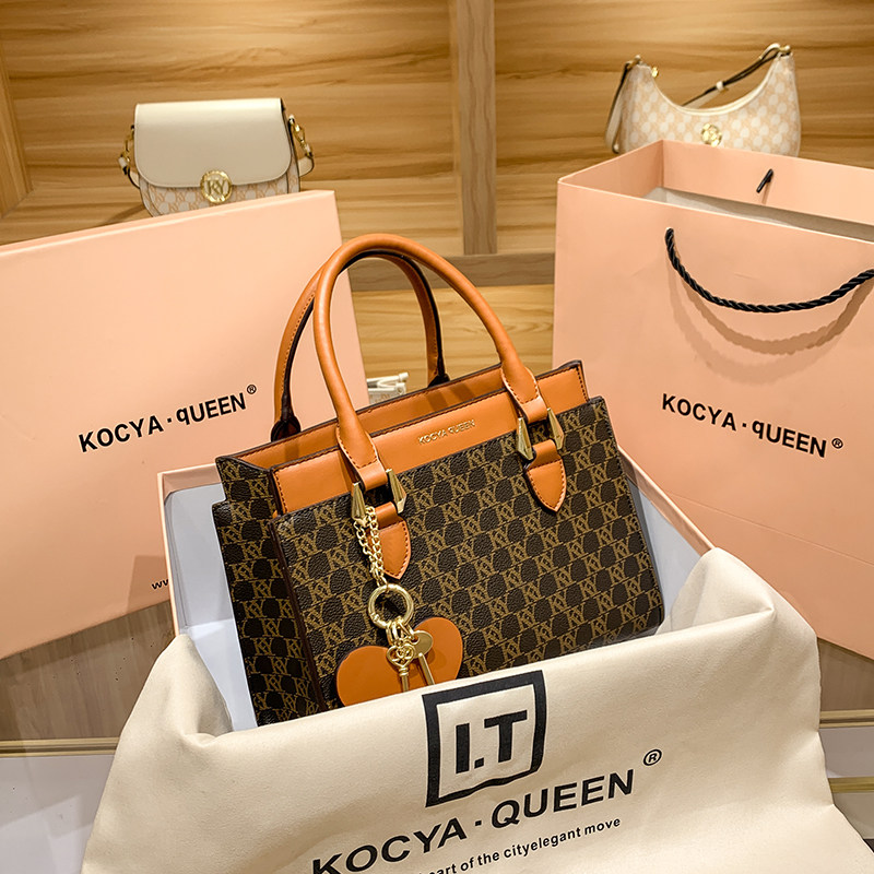 代购小众品牌包包女2021新款真皮女士手提包时尚斜挎单肩女包v-lv