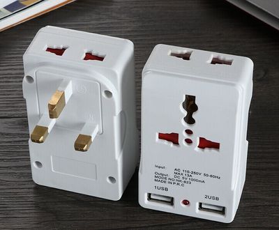 包邮旅行插座 全球通双USB转换插头 万用转英规转换插头823E