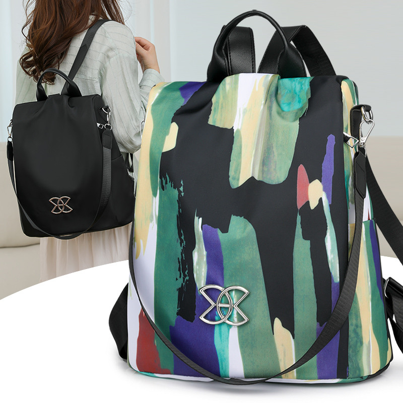 防盗双肩包女2024新款时尚轻便大容量书包牛津布尼龙旅行背包通勤