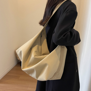 大容量帆布斜挎包女洋气潮流单肩背包百搭托特包时尚 慵懒风饺子包