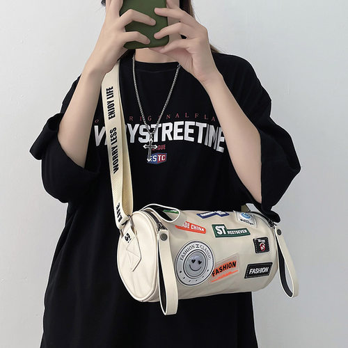 阿哟工装潮牌个性圆筒包