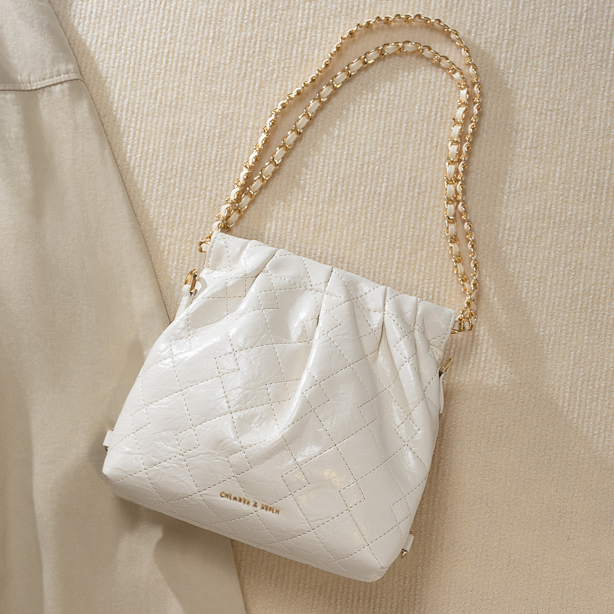 迈特蒂2025新款菱格小众包女链条通勤休闲简约单肩斜挎腋下包