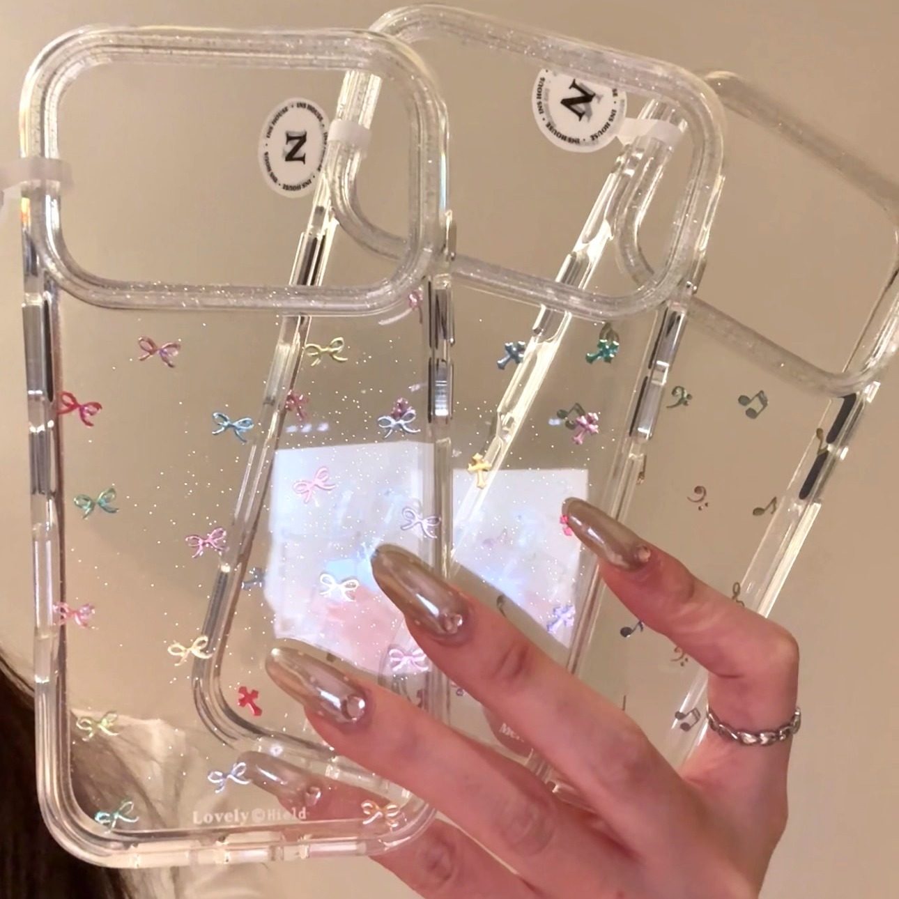 简约ins透底满屏炫彩蝴蝶音乐十字架适用iphone17promax苹果16pro手机壳15pro新款小众简约设计感防摔保护壳