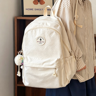 日本品质书包女生初中学生背包女减负护脊大容量小学生轻便双肩包