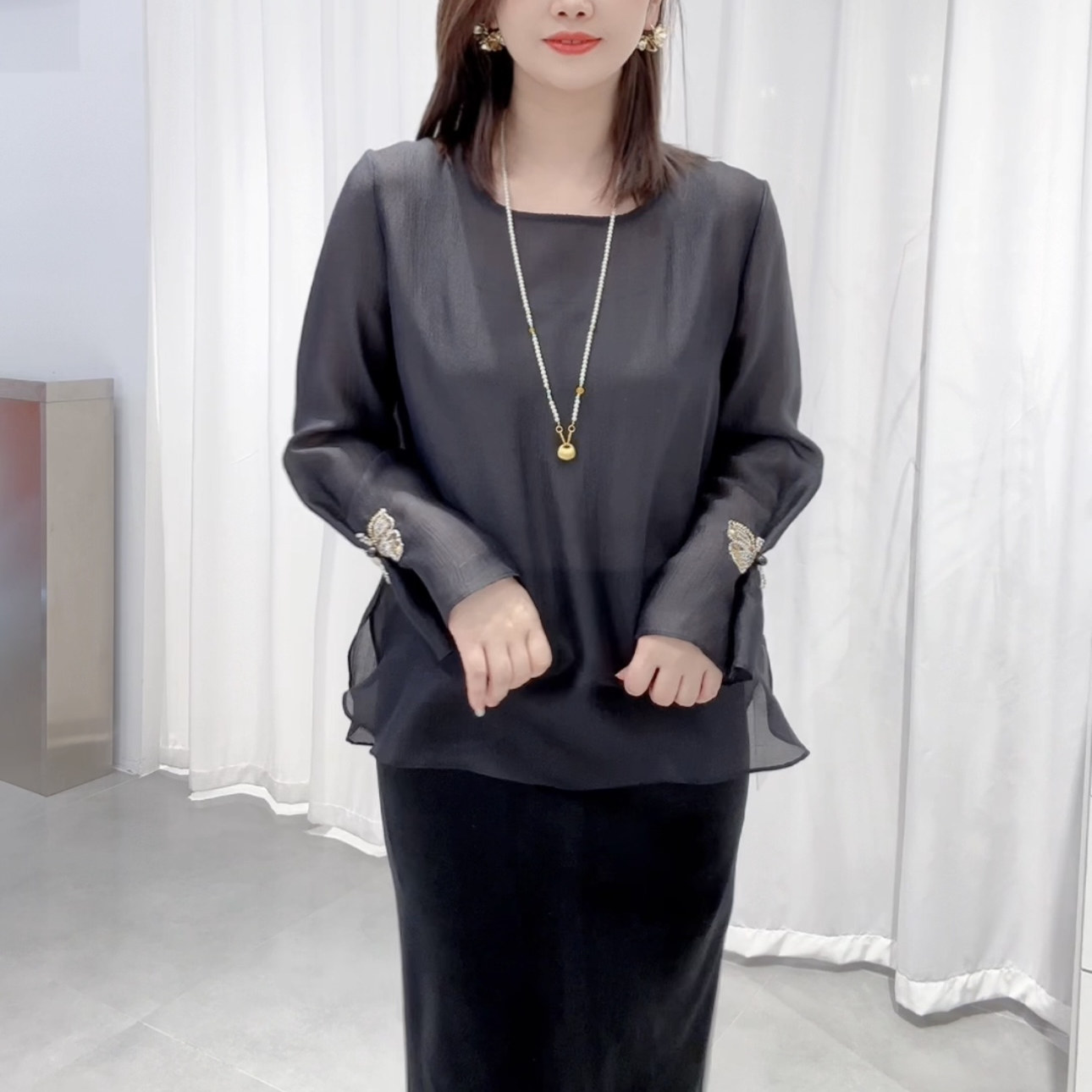 2026春季新款时尚气质休闲圆领纯色钉珠不规则下摆百搭衬衫女上衣