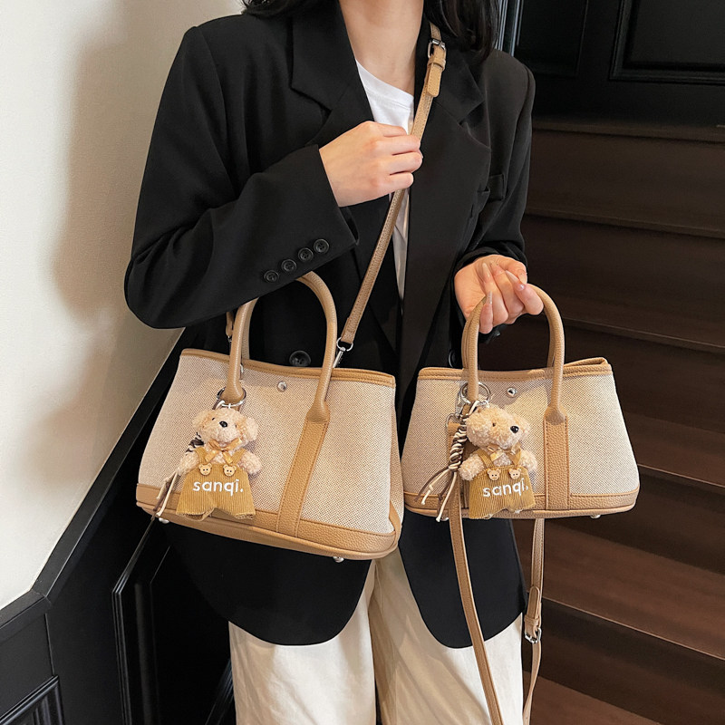 休闲大容量帆布包包女2025新款通勤百搭单肩斜挎包撞色手提托特包,箱包皮具/热销女包/男包,通用款女包,淘宝优惠券,粉丝福利购,淘宝优惠卷