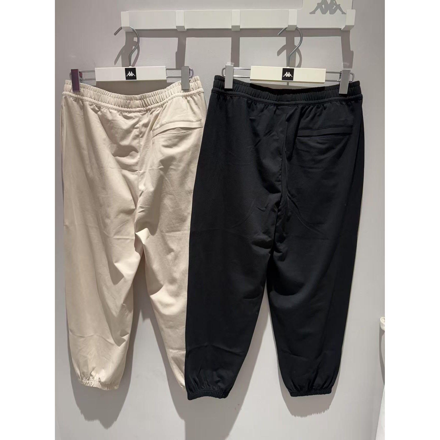 卡帕背靠背Kappa女子2025夏款运动休闲长裤9分裤K0F42CJ80