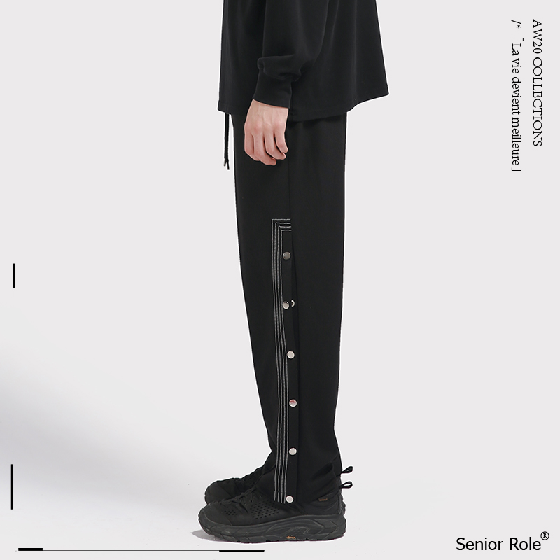 运动侧排扣黑色宽松直筒休闲裤子