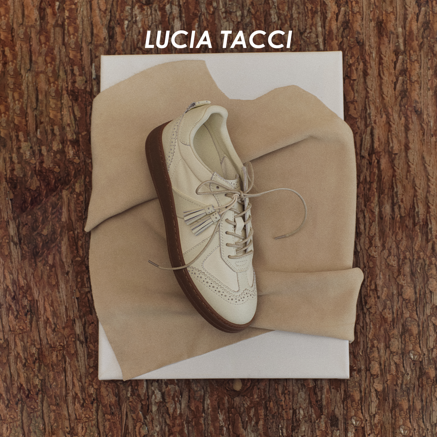 LUCIA TACCI 复古皮质布洛克雕花流苏德训休闲鞋26SS春夏新品