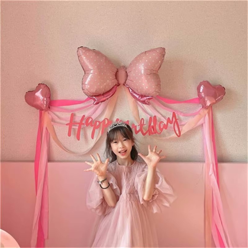 粉色蝴蝶结铝膜气球背景布置