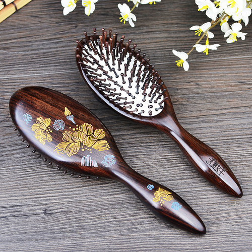 家用气垫板黑绿檀木梳子按摩梳