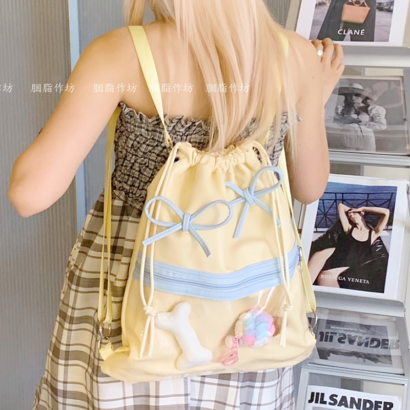 YZ抽绳蝴蝶结设计感痛包双肩少女出游上下班通勤背包小食量旅行包