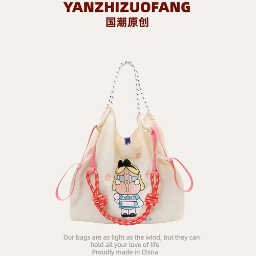 YZ可爱大容量通勤单肩托特包包女卡通哭娃外出通勤尼龙手提斜挎包 - 封面