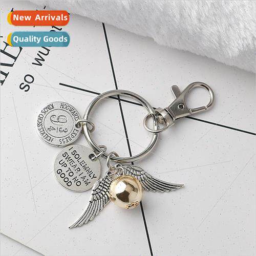 Golden flying thief keychain film and   jewelry wings pendan