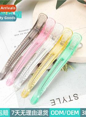 Positioning and styling dividing hair clips hair salons hous