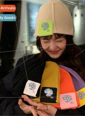 solid color large flower label knitted fisherman hat modelli