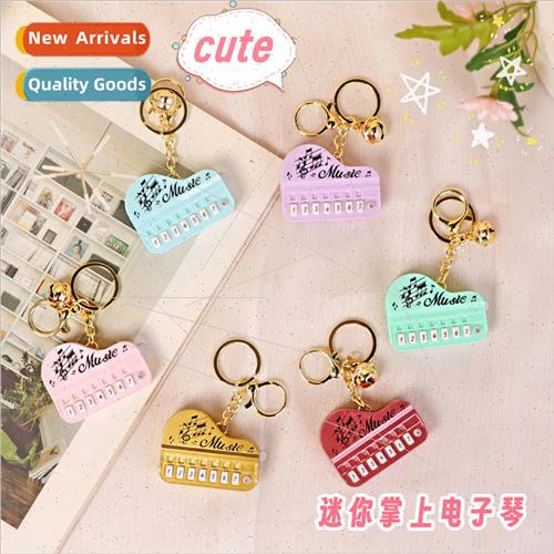 Mini handheld electronic piano game machine cute luminous ke