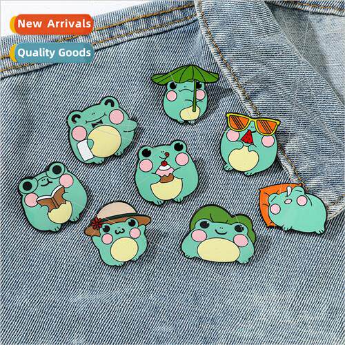 Cartoon cute little frog brooch wearing sunglasses reading a