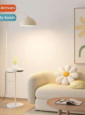 Cream wind floor lamp living room sa next to wireless chargi