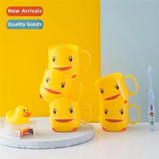 cup childrens gargle toothpaste yellow toothbrush duck