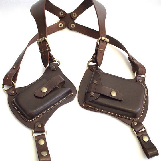 欧美背带腋下挎包男女户外手机包拉链钱包小包Underarm satchel。
