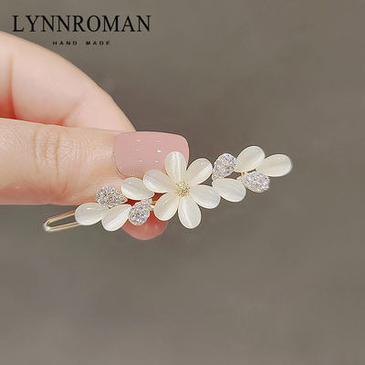 花朵LYNNROMAN边夹仿猫眼