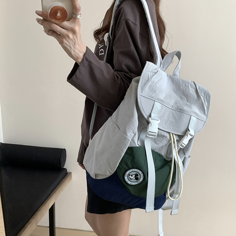 韩国尼龙帆布双肩包包女2025新款潮学院风书包女休闲大容量电脑包