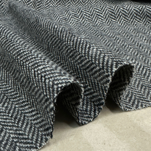 黑+白灰粗纺岗花人字羊毛呢面料编织秋冬马甲裤子尼大衣服装布料