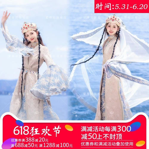 Синьцзян Девушка Юньнан Дали Лицзян Бригада Фотография Уйгур показывает фотоаппарат национального стиля