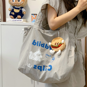 慵懒风刺绣单肩包包女2026新款潮手提托特包学生上课大容量购物袋