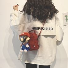 网红同款小包包女2020新款潮可爱丑萌双肩包韩版百搭帆布斜挎包女