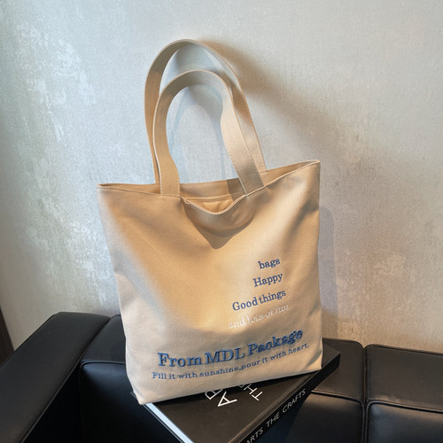 大容量帆布包女休闲购物袋手提文艺小众单肩包学生补课逛街托特包