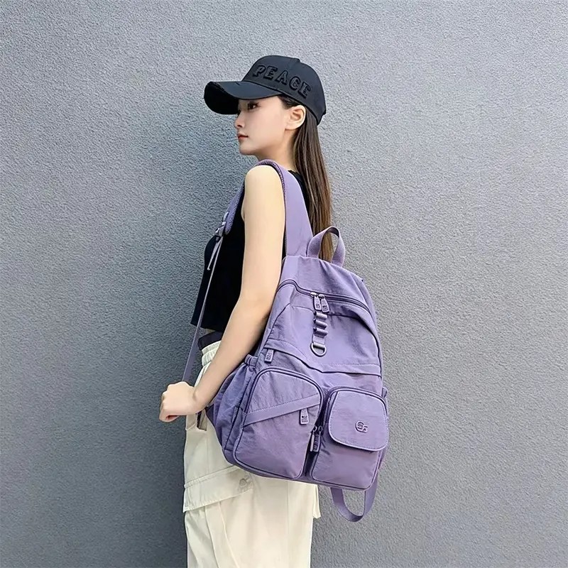 新款简约轻便双肩包百搭时尚大容量背包旅行通勤学生书包套拉杆箱