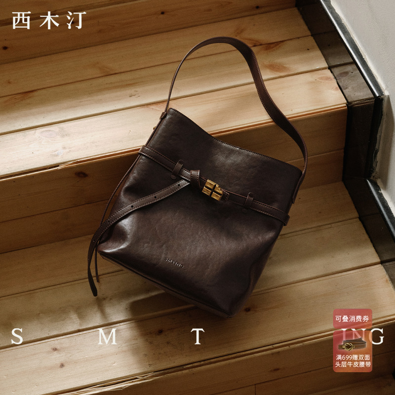 西木汀暗夜 水桶包女轻奢小号秋冬通勤单肩斜挎包设计感小众包包