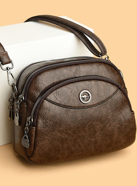 真皮牛皮包包女2025新款休闲百搭小圆包大容量独立三层单肩斜挎包