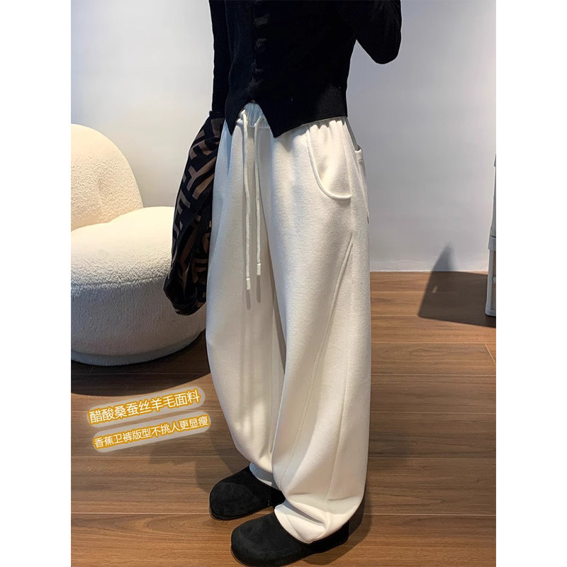 英国DHWA休闲羊毛香蕉卫裤女2025新款秋冬宽松加绒运动垂感弯刀裤